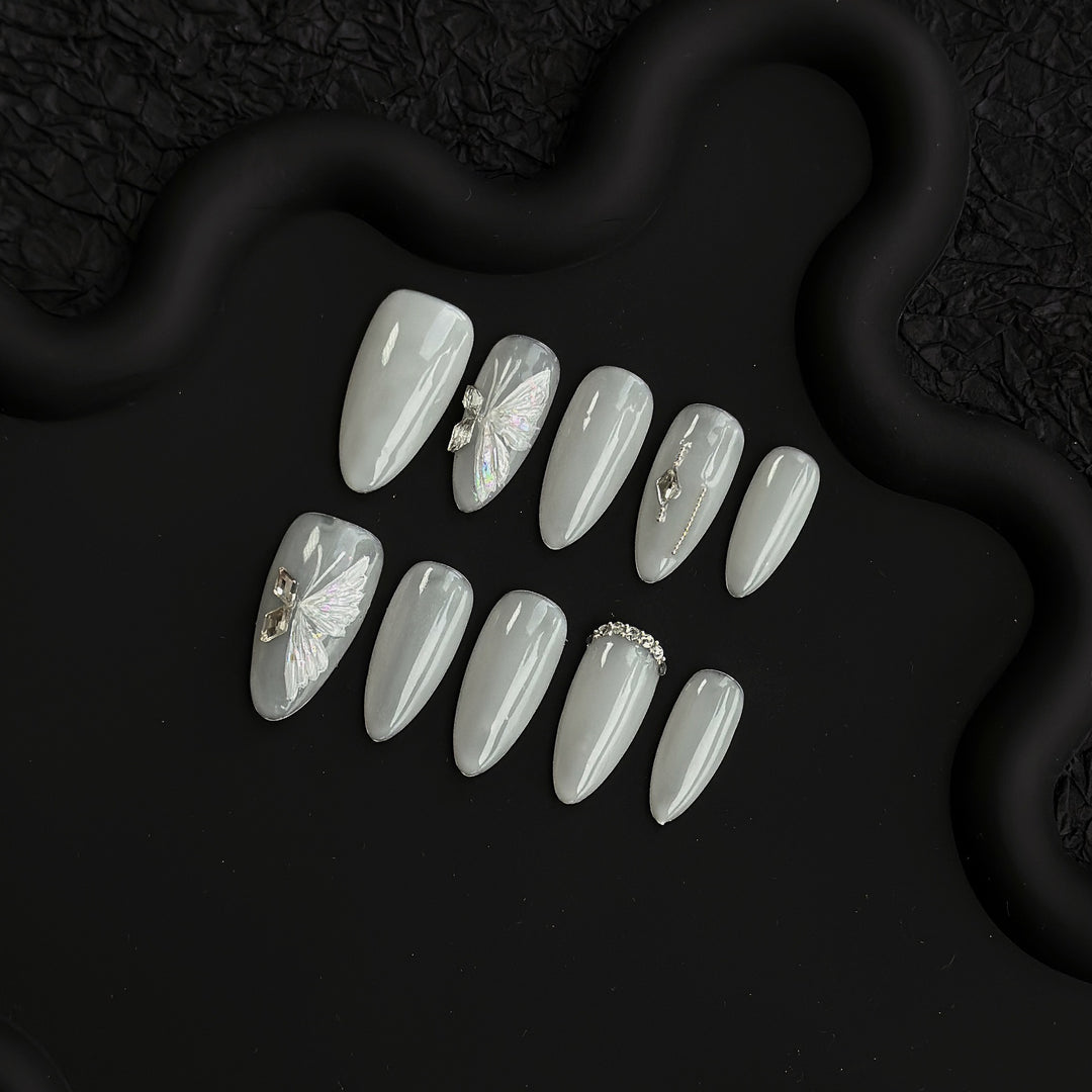 Artistic Press-On Nail Set with Elegant Butterfly and Gem Accents