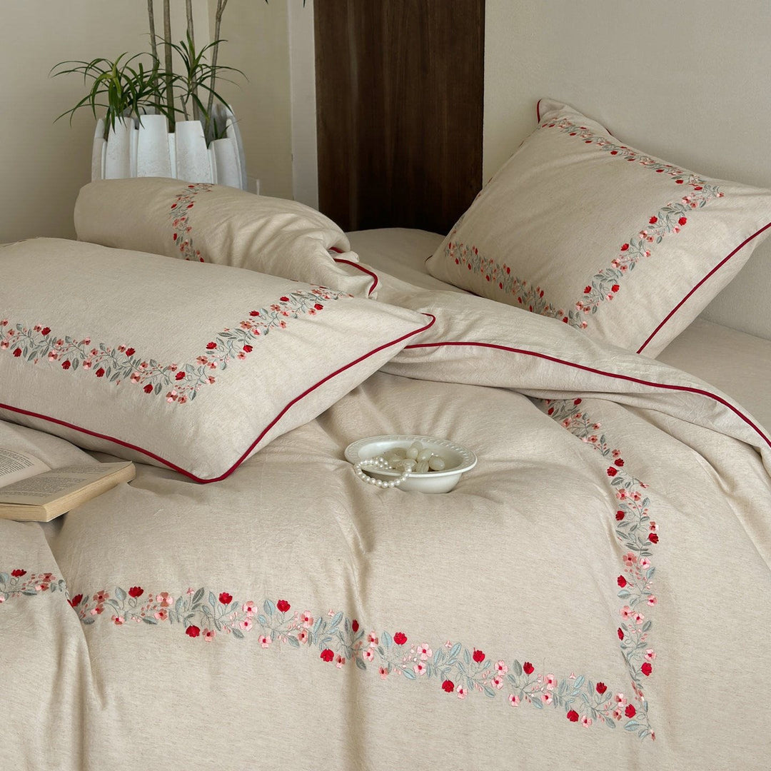 High-quality cotton-linen bed linen set with fine floral embroidery and piping edge