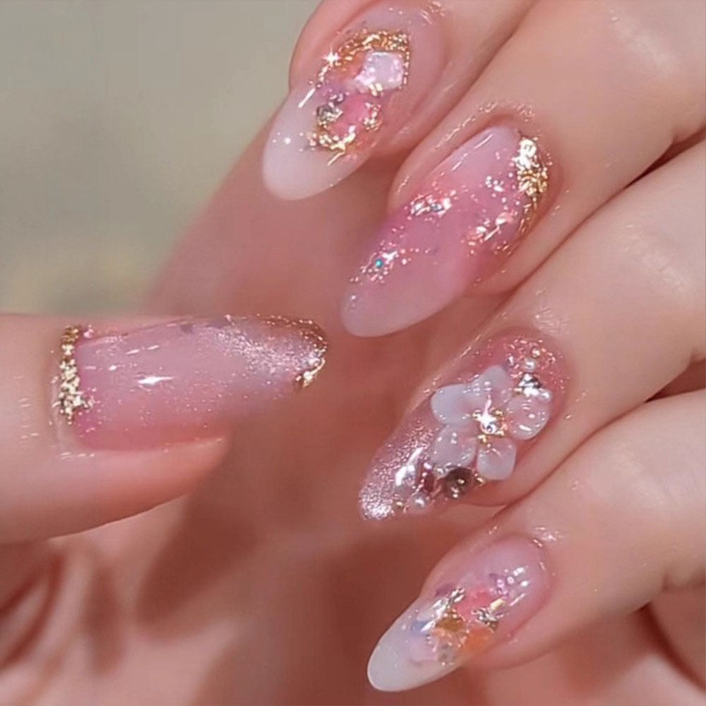Artificial nails with delicate floral decorations and glitter effects Kalsten