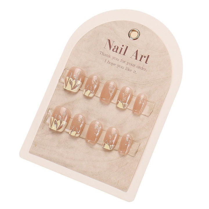Decorative Press-On Nail Set with Floral and Metallic Accents Kalsten