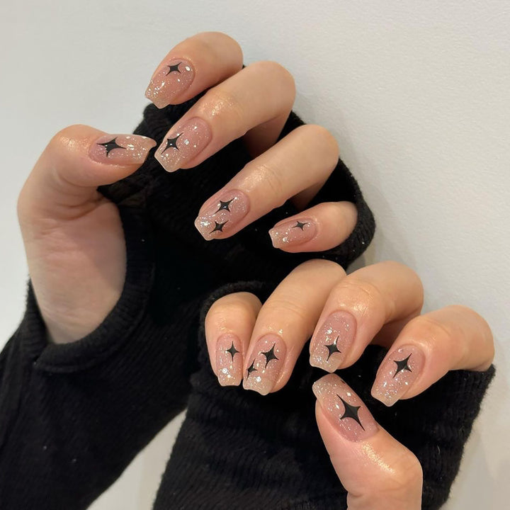 Artful Nail Extensions with Glitter and Star Pattern Kalsten