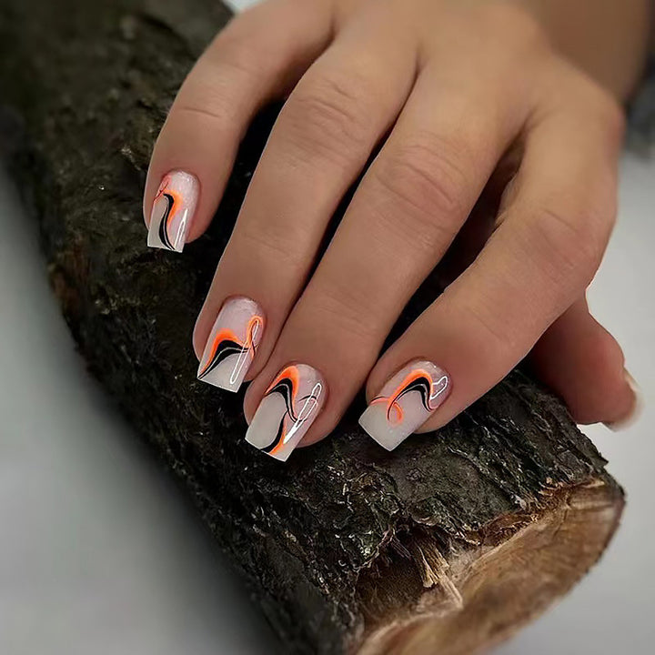Creative nail tips with intricate marbling effects Kalsten