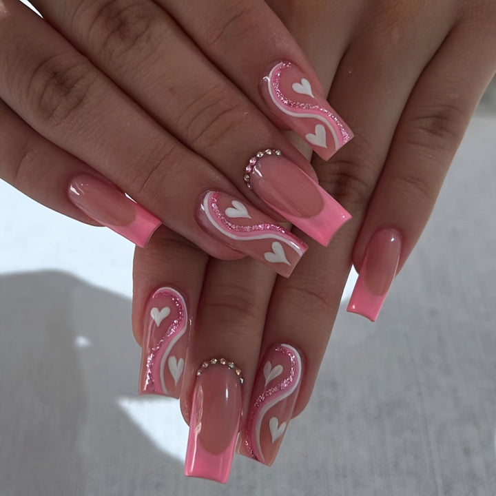 Artificial nail set with romantic heart designs and glamorous accents Kalsten