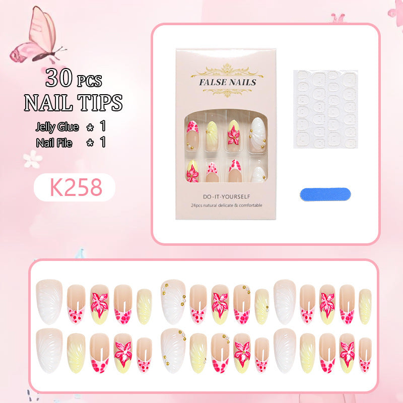 Artificial nail set with floral motifs and elegant embellishments Kalsten