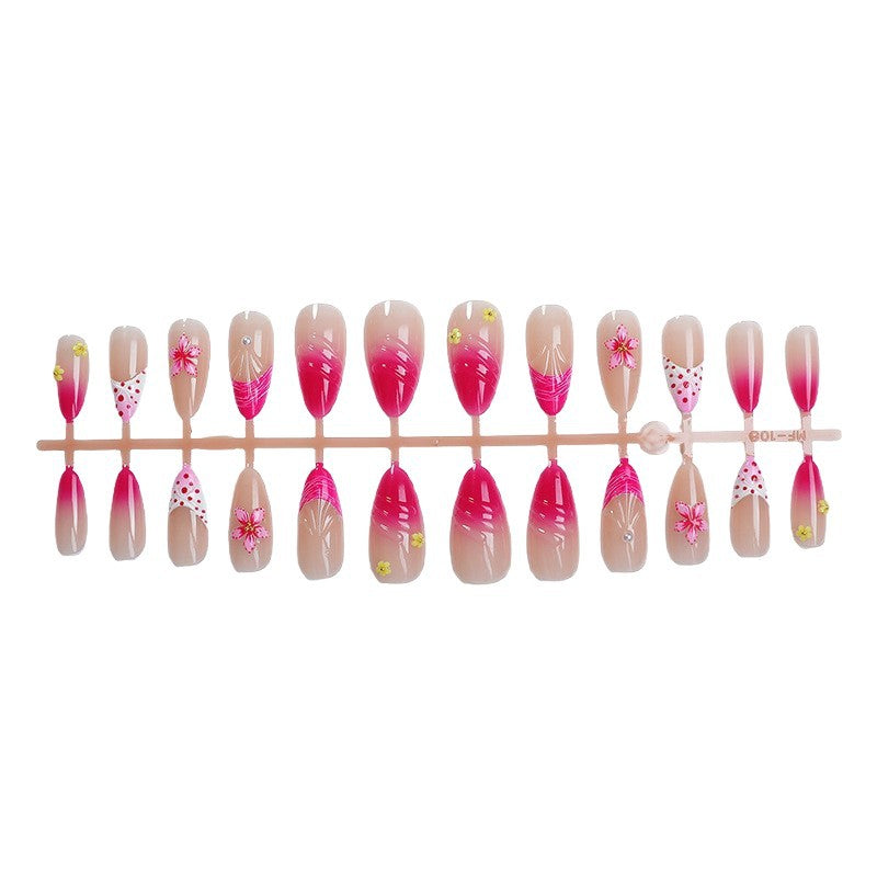Artful nail tips with delicate floral embellishments Kalsten