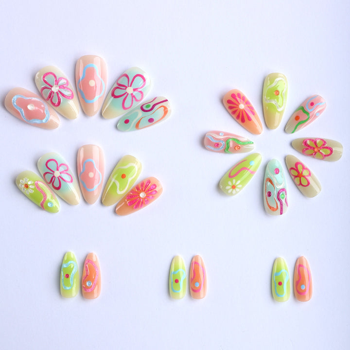 Artificial nails in the creative flower and foil design Kalsten