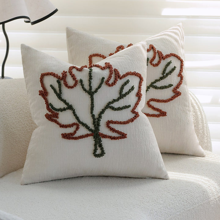 Square decorative pillow cover with hand-tufted leaf motif and fine linen texture Kalsten