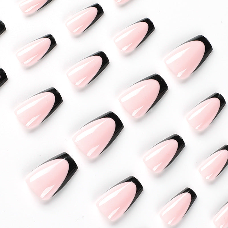 Elegant stiletto nails with contrasting French tip Kalsten