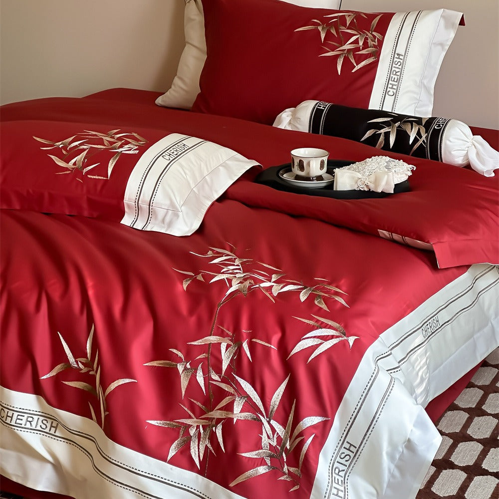 Duvet cover set made of cotton satin with embroidered bamboo motif, fine border & decorative roll cover