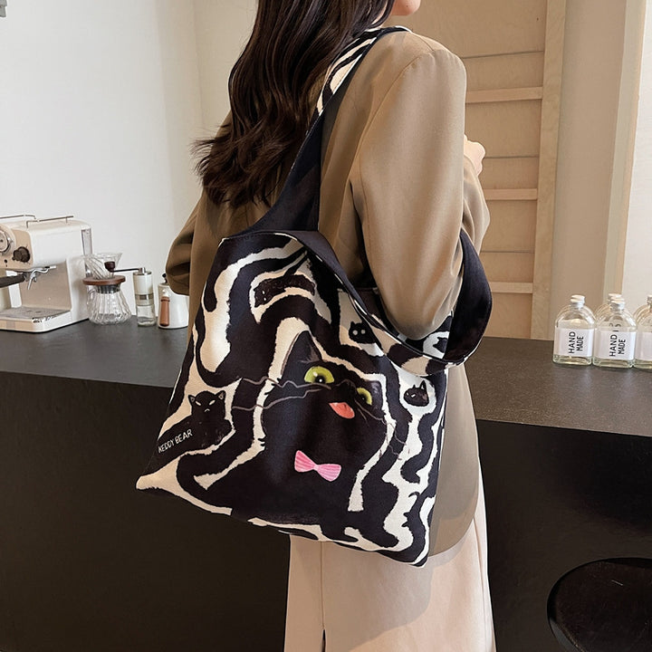 Shoulder bag with playful cat motif Kalsten