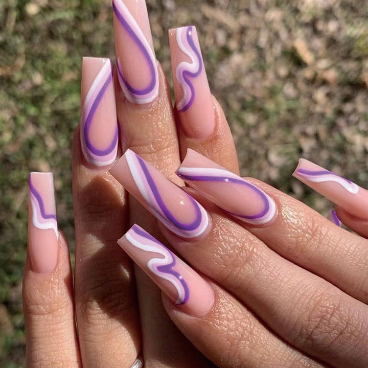 Artful nail extensions with elegant wave pattern Kalsten