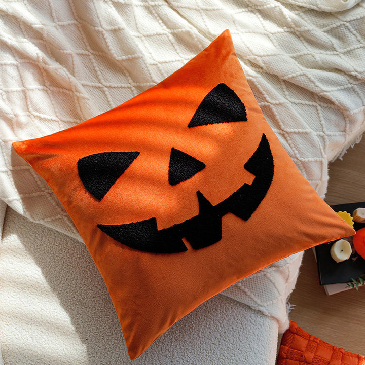 Square decorative cushion cover with Halloween pumpkin face tuft appliqué made of velvet Kalsten