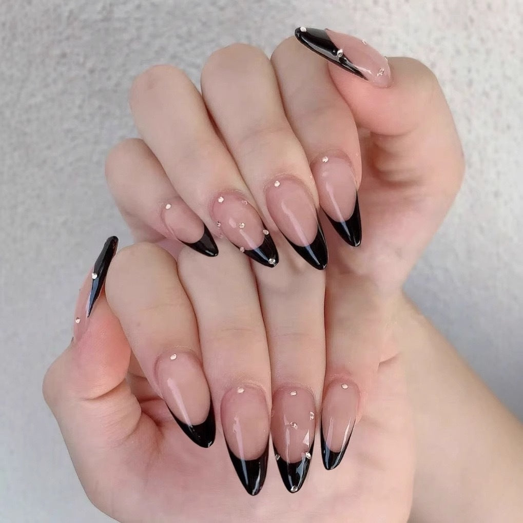Artificial nail tips with elegant French design and glamorous details Kalsten