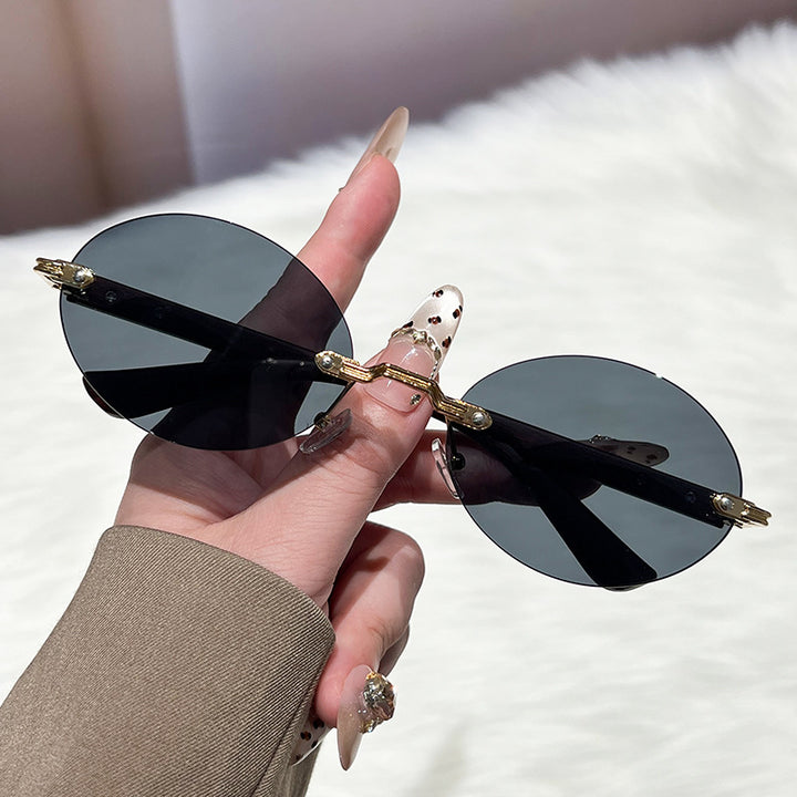 Ladies fashionable and elegant sunglasses with oval design Kalsten