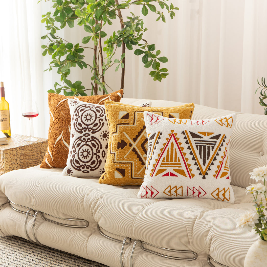 Bouclé pillow with hand-stitched ethnic design and removable cover Kalsten