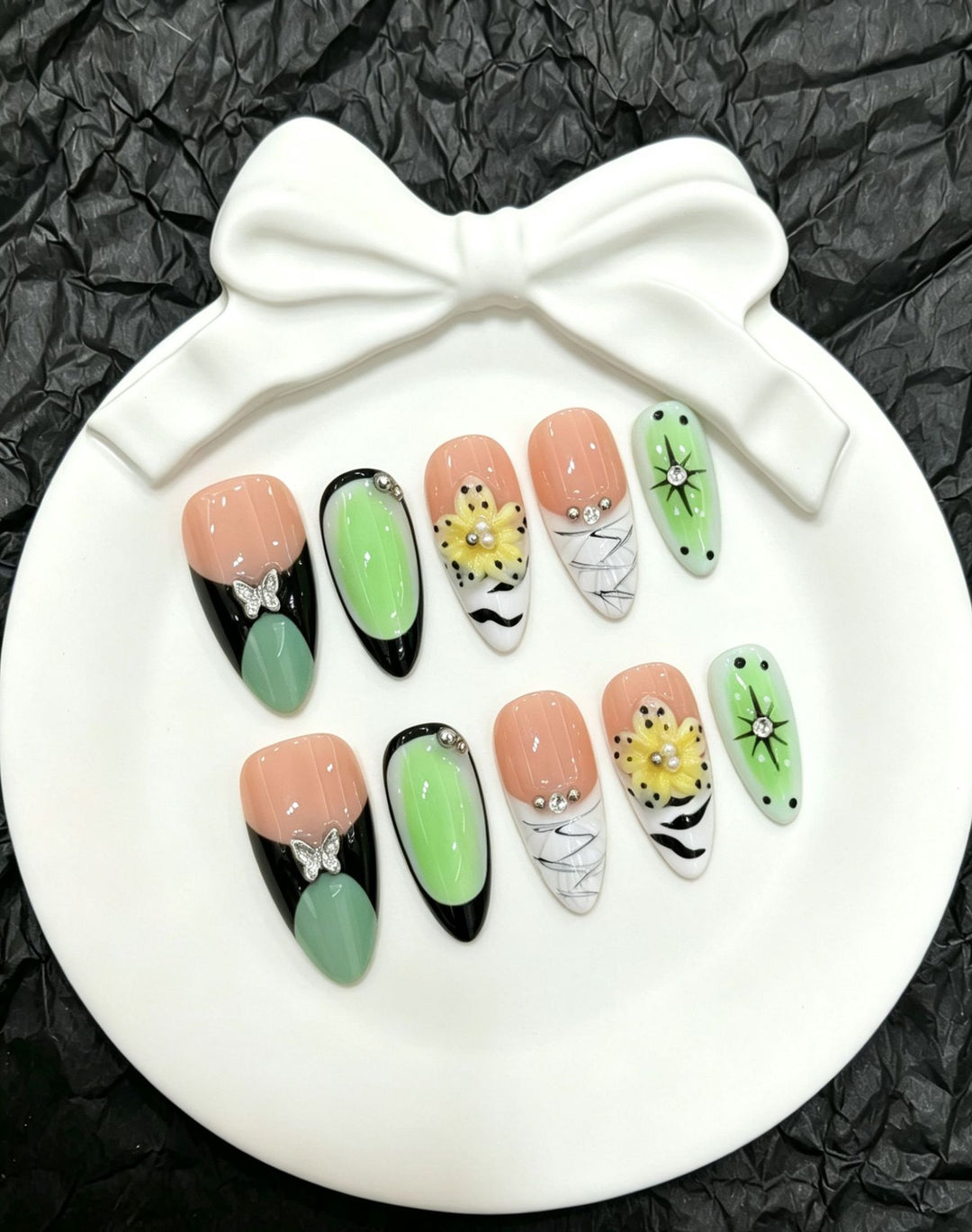 Artistic Press-On Nail Art Set with Floral and Butterfly Accents