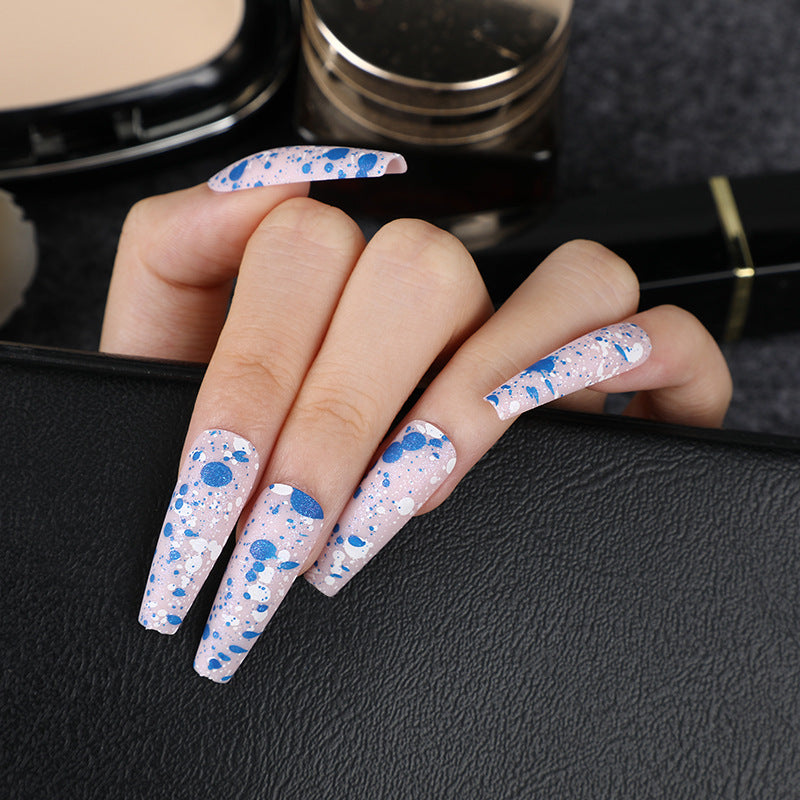 Artistic splatter design artificial nails Kalsten