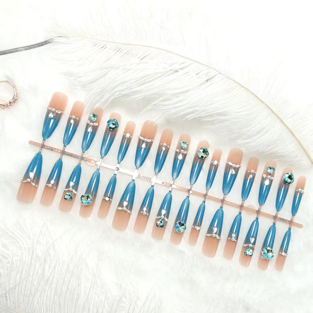 Glamorous artificial nails with sparkling rhinestone elements Kalsten