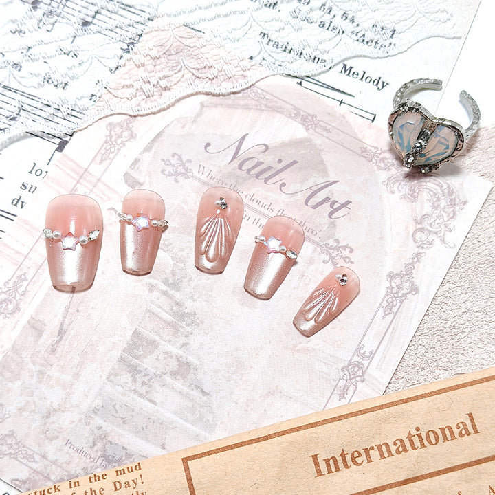 Elegant artificial nails with pearl and rhinestone embellishments Kalsten
