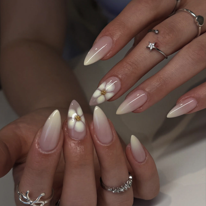 Elegant Stiletto Nails with Floral Accents Kalsten