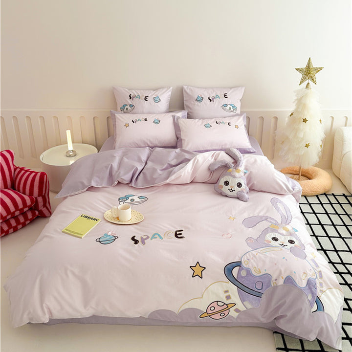 Children's bedding set with playful space bunny design