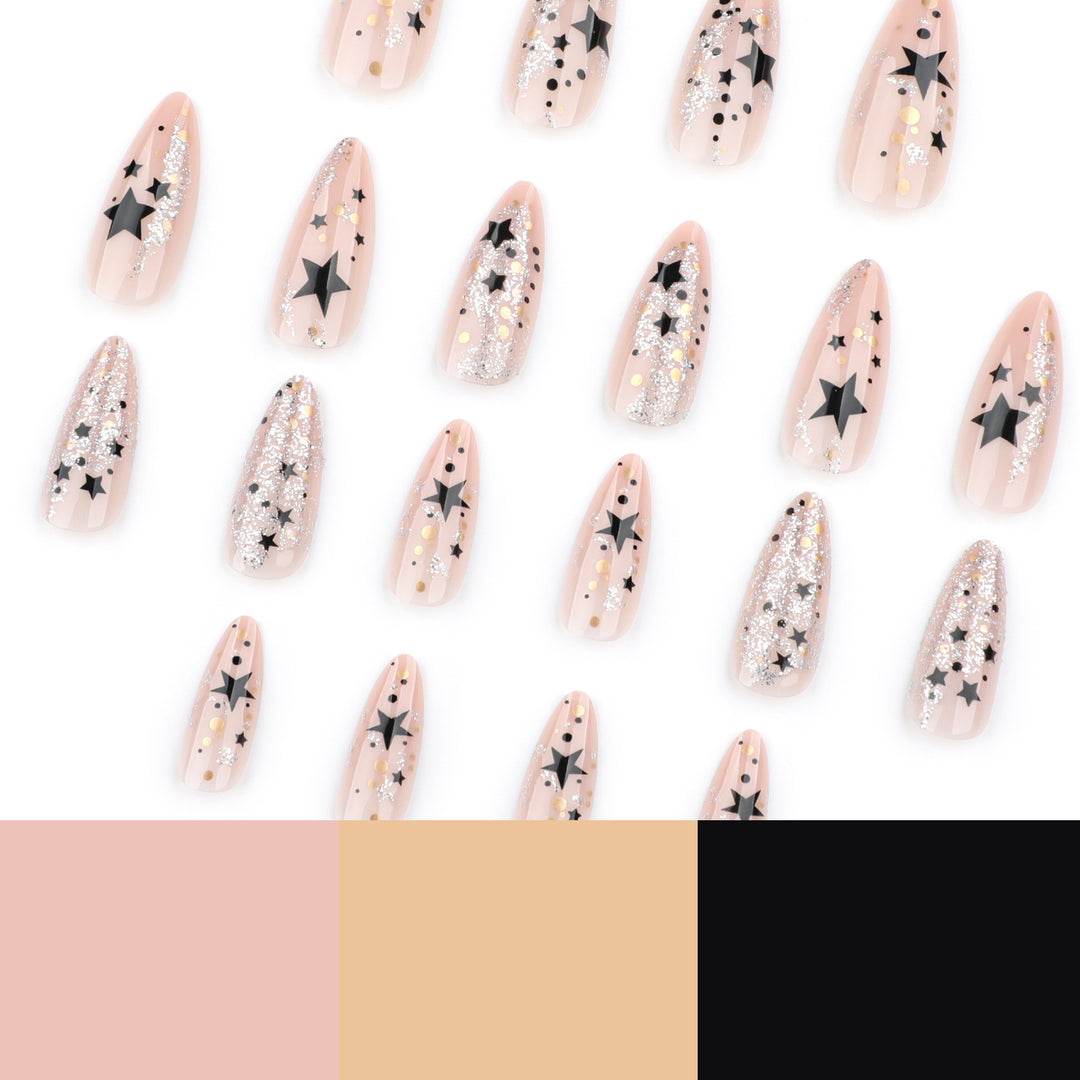 Artistic stiletto nails with glitter and star design Kalsten