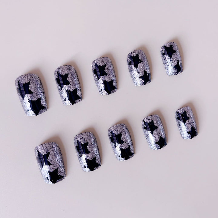 Artificial nail set with glamorous rhinestone embellishments and star motifs Kalsten