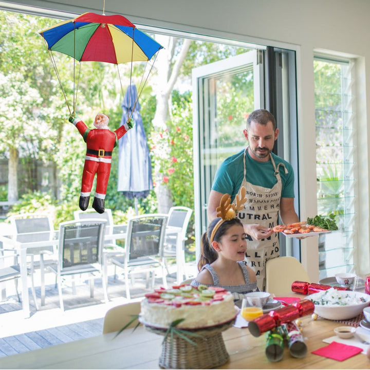 Inflatable Santa Claus figure with parachute