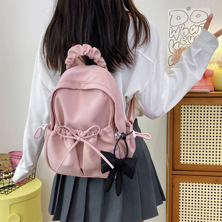 Fashionable backpack with playful details Kalsten