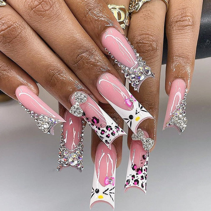 Glamorous artificial nail set with sparkling rhinestone embellishments and creative animal designs Kalsten