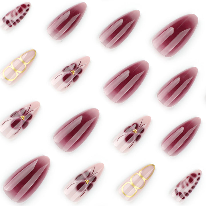 Elegant Nail Art with Floral Design and Glitter Accents Kalsten