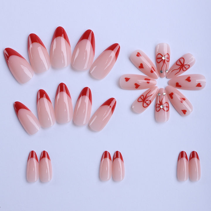Artificial nails with elegant heart designs and glamorous accents Kalsten