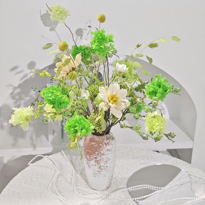 Lively Floral Arrangement in Decorative Ceramic Vase