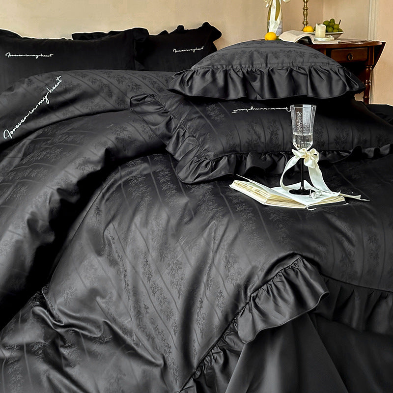 Luxurious satin bedding set with ruffles and jacquard floral pattern
