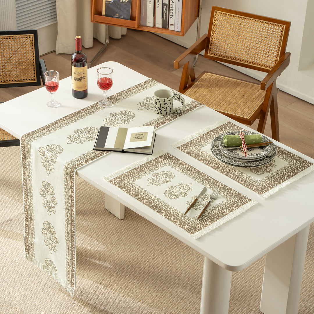 Round handmade woven decorative rug with fringes and botanical pattern Kalsten