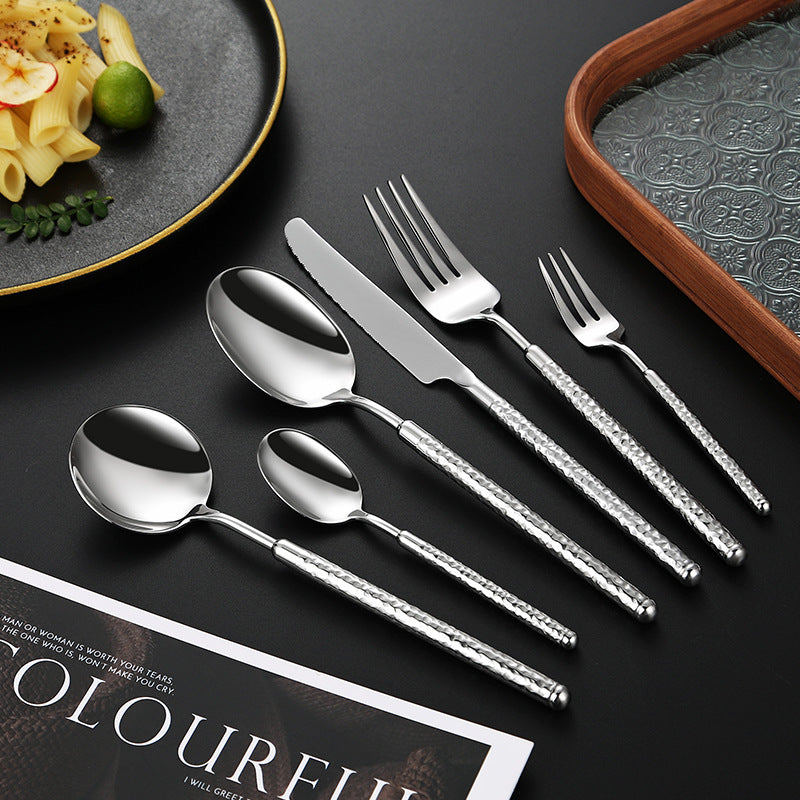 Elegant dessert spoon with elaborate handle design Kalsten