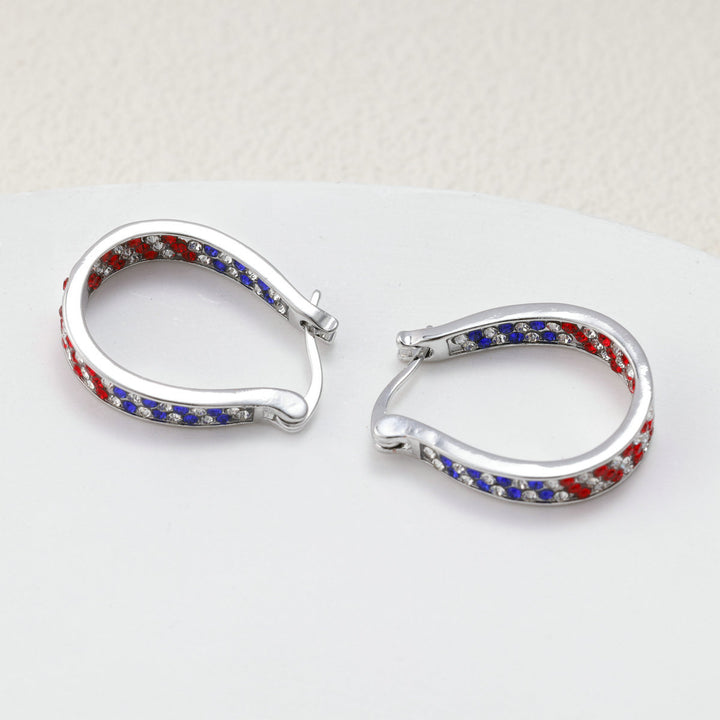Ladies nano curved clip-on earrings with dense rhinestone embellishment and polished metal alloy Kalsten