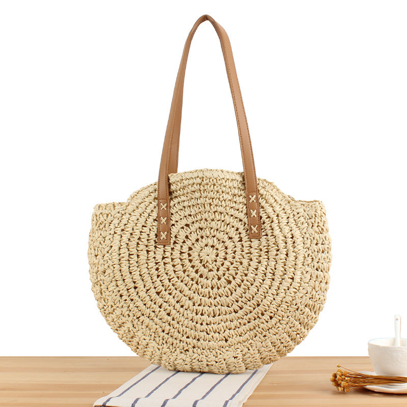 Round straw bag with leather handles Kalsten