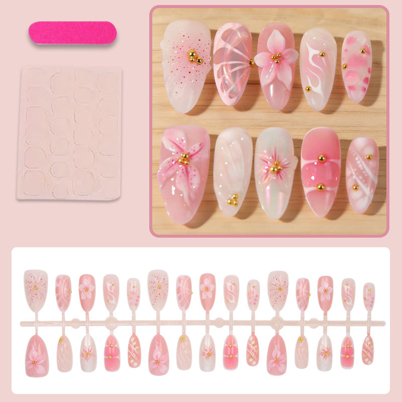 Artificial nails with floral designs and glitter accents Kalsten