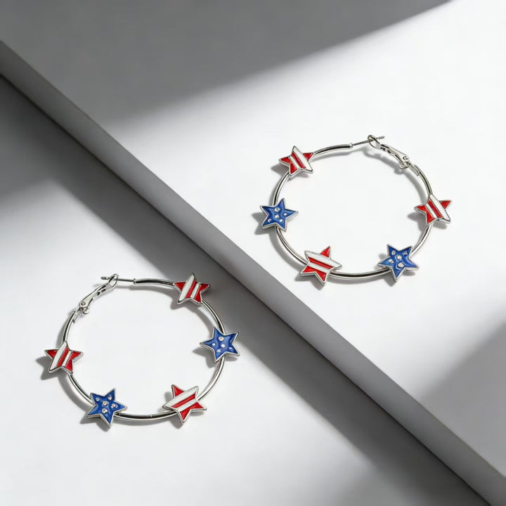 Women's playful hoop earrings with enamel star appliqués and secure click closure Kalsten