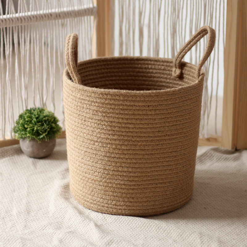 Handcrafted storage basket made of natural material Kalsten
