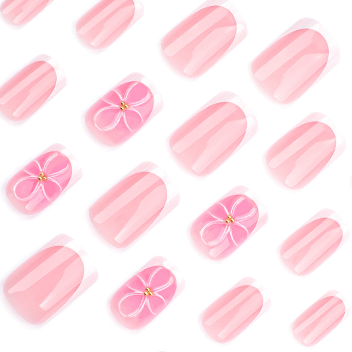 Artistic nail art with delicate flowers and elegant French lace Kalsten