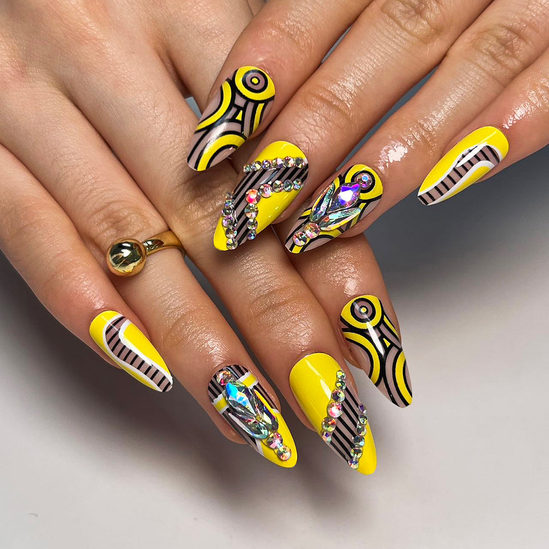 Artful nail extensions with geometric design and glitter accents Kalsten