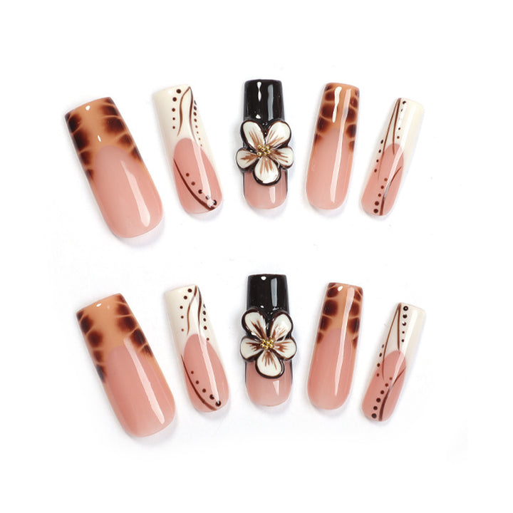Creative nail art set with delicate floral and glitter accents Kalsten
