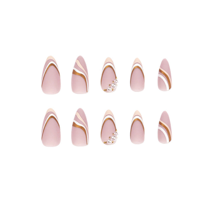 Artful stiletto nails with elegant gold and white accents Kalsten