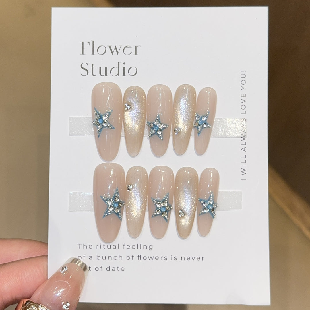 Glamorous artificial nails with star accents Kalsten