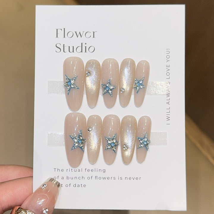 Glamorous artificial nails with star accents Kalsten