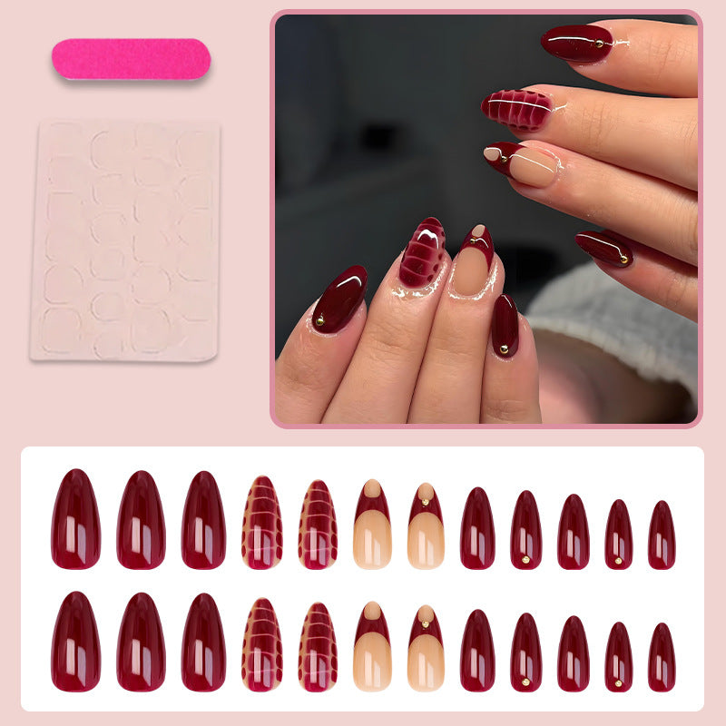Acrylic nail set with elegant golden accents and trendy design Kalsten