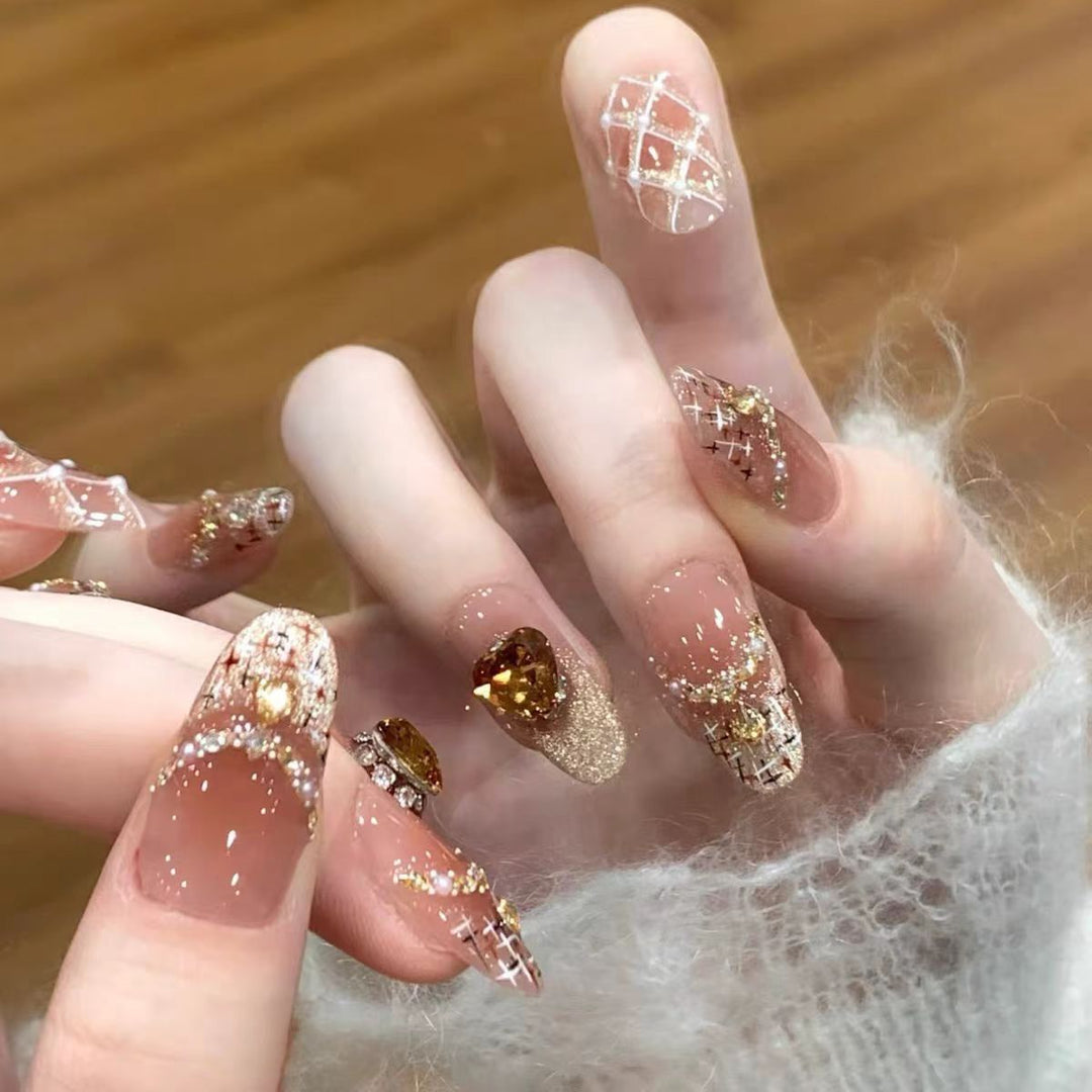 Artificial nails with glitter and heart accents Kalsten