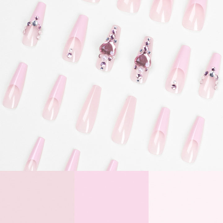 Glamorous nail extensions with glitter embellishments Kalsten